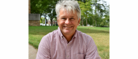 Head shot of Gregory Alexander.